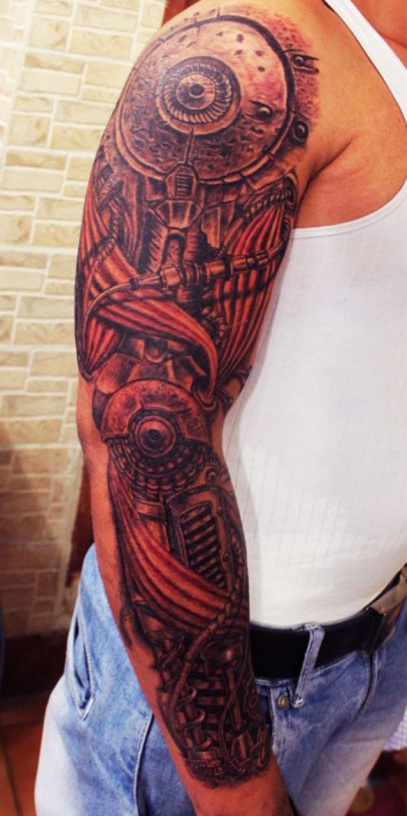 biomechanical tattoo by gupt ram,best tattoo artist in india,best tattoo artist in manali, full arm tattoo