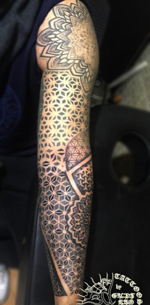 Geometrical tattoo on full arm by gupt ram best tattoo artist in manali,best tattoo shop in manali